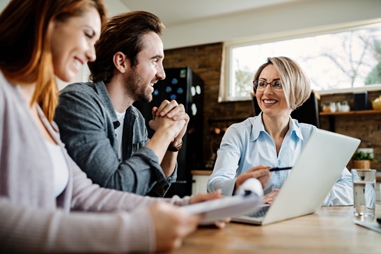 Financial advisor talking to a couple