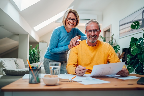 Senior couple sitting at table